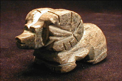 Adorable, tiny ram craftfully cut from dark gray alabaster. Zuni made.